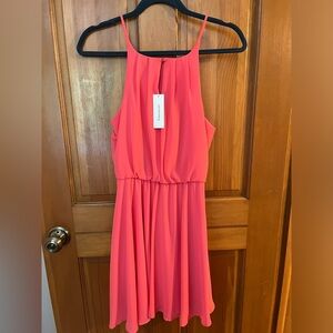 “Blue Rain” mini dress. Size small. Never worn with tags.